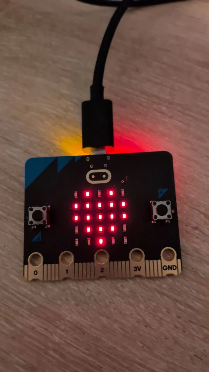 Heart displayed on the micro:bit LED matrix